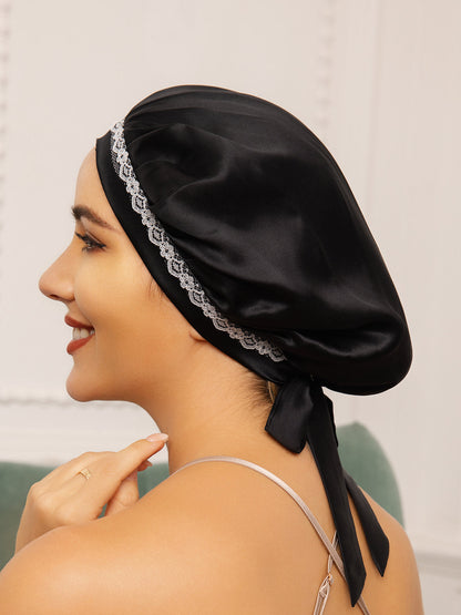 Gorro de encaje de pura seda con cintas