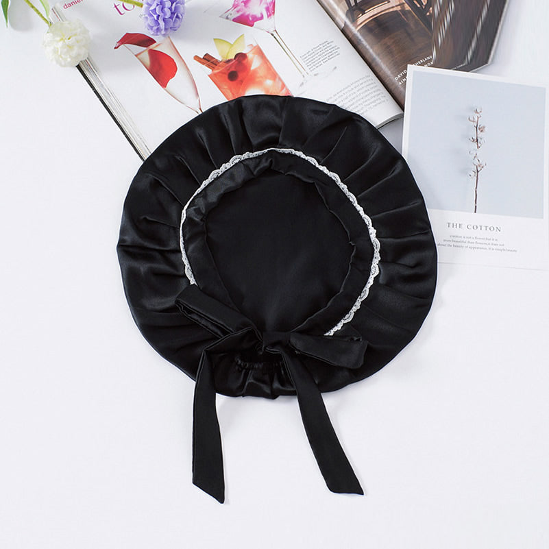 Gorro de encaje de pura seda con cintas