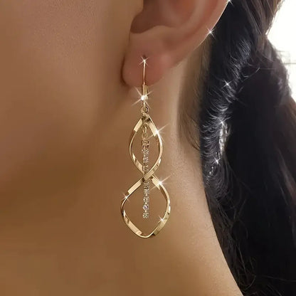 Pendientes en forma de espiral de estallido solar | Oro