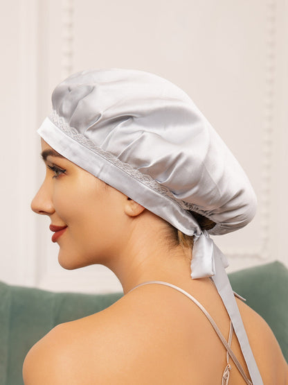 Gorro de encaje de pura seda con cintas
