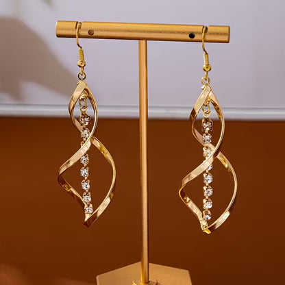 Pendientes en forma de espiral de estallido solar | Oro