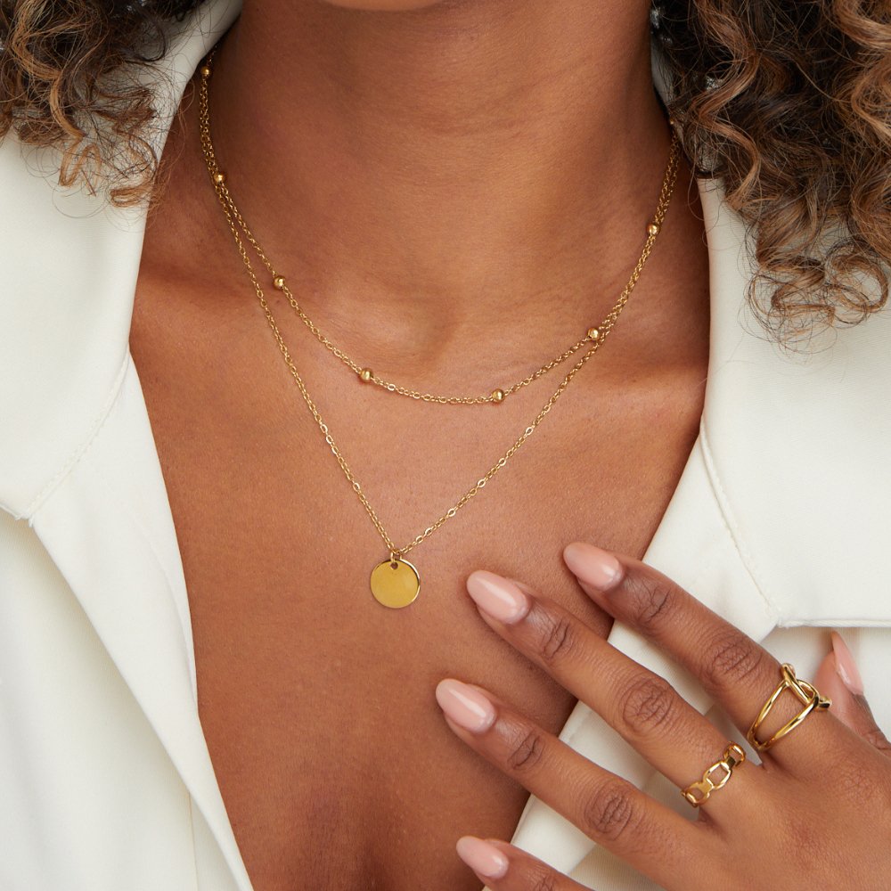 Collar con disco laminado