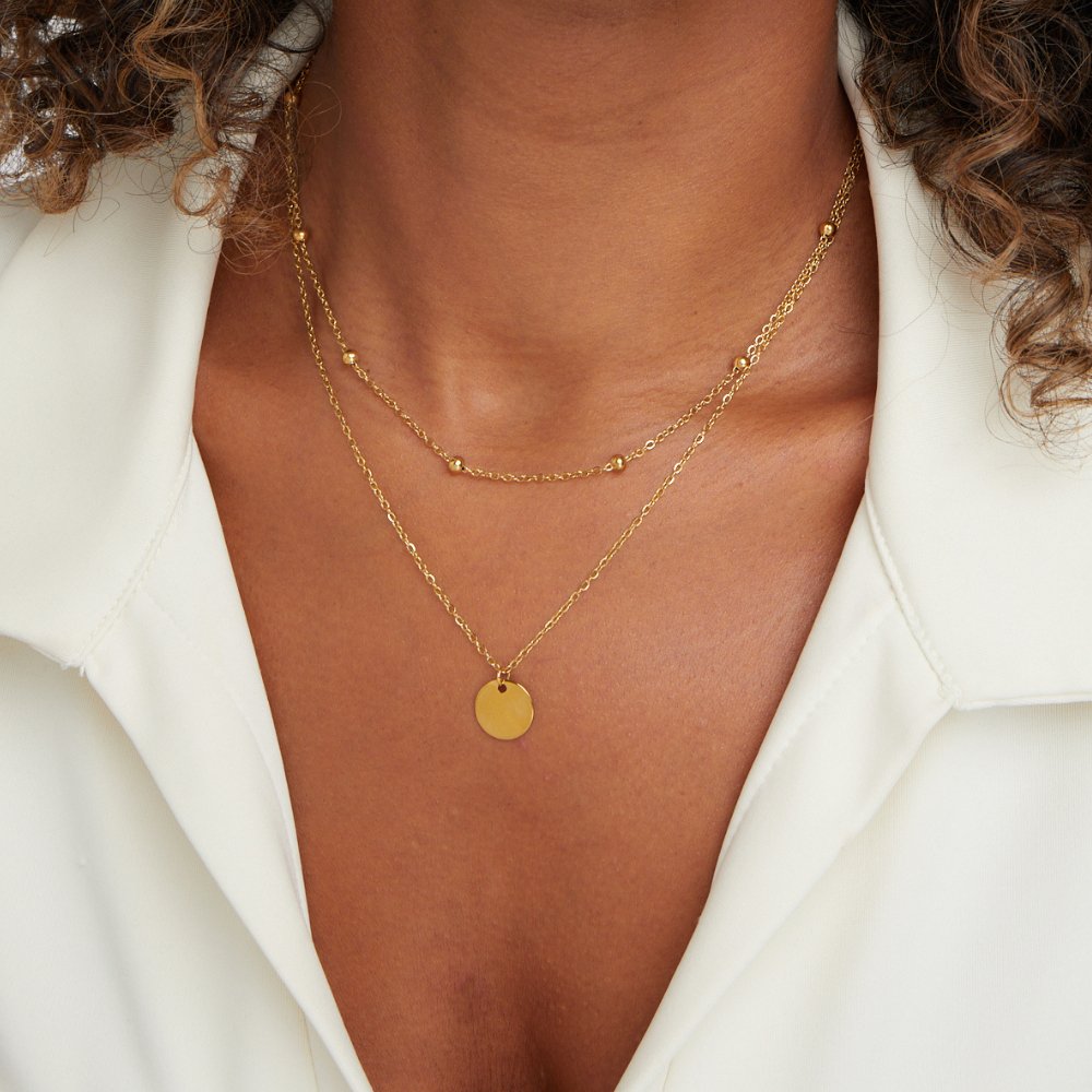 Collar con disco laminado