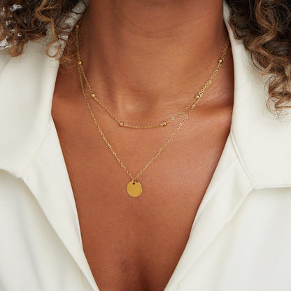 Collar con disco laminado